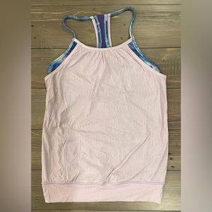 Ivivva by Lululemon tank top. Built in shelf bra. Great condition! Size 12.